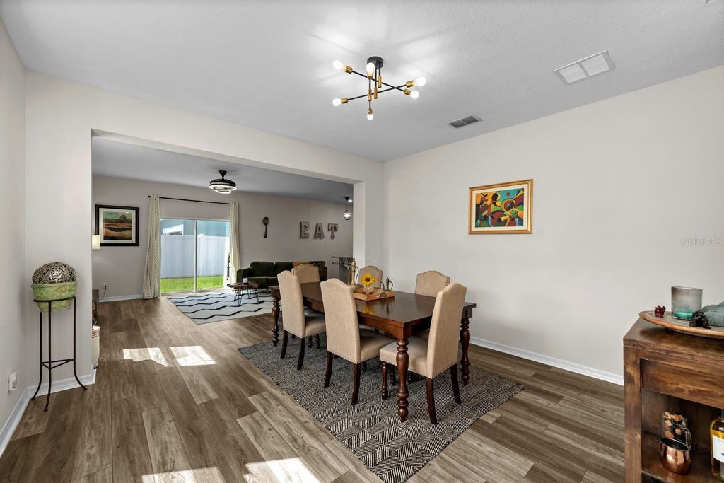 Photo of 32718 Harmony Oaks Drive, Wesley Chapel, FL 33545 (MLS # TB8389166)