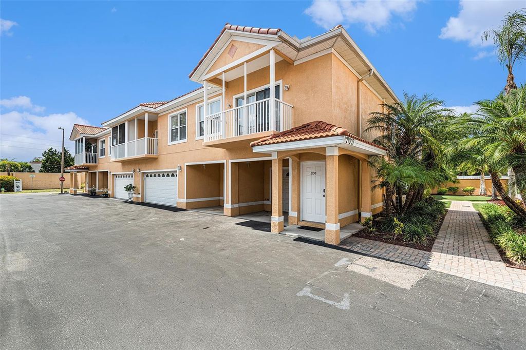 Photo of 21007 Sunpoint Way #203, Lutz, FL 33558 (MLS # TB8390991)