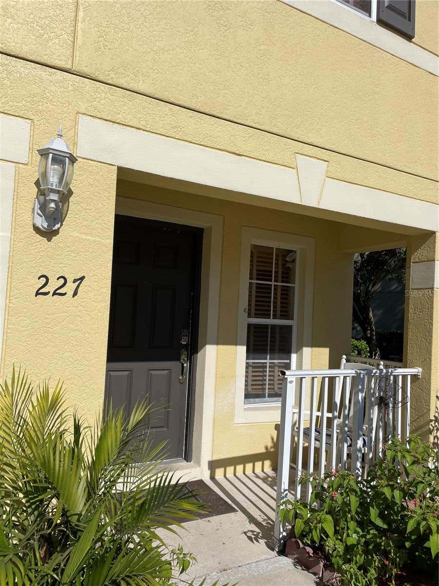 Photo of 227 Glowing Peace Lane #83, Orlando, FL 32824 (MLS # O6416560)