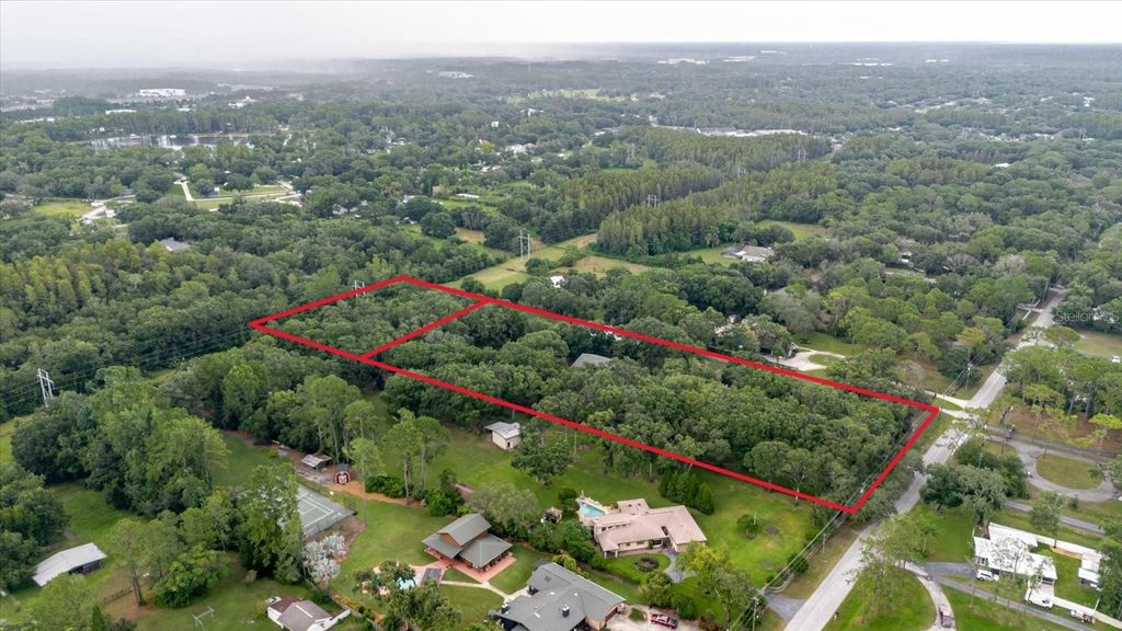 Photo of 5455 Lake Le Clare Road, Lutz, FL 33558 (MLS # TB8414223)