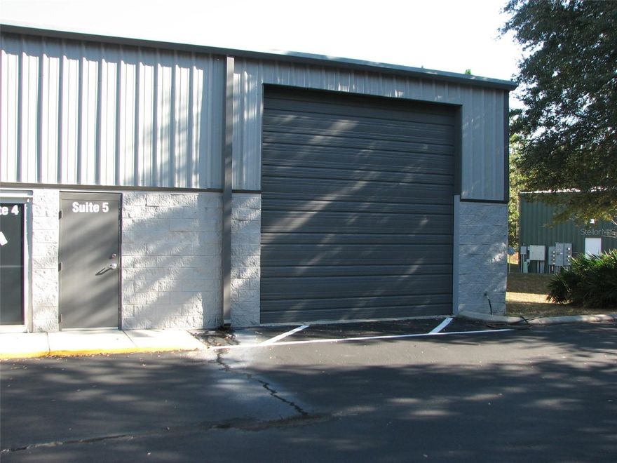 Available January 1st : 1,500 SF warehouse or light industrial space with an office and designated parking in Gainesville’s growing northwest corridor. The building offers one grade-level 18 ft roll-up door, open warehouse area, restroom, and paved access for easy loading and deliveries.