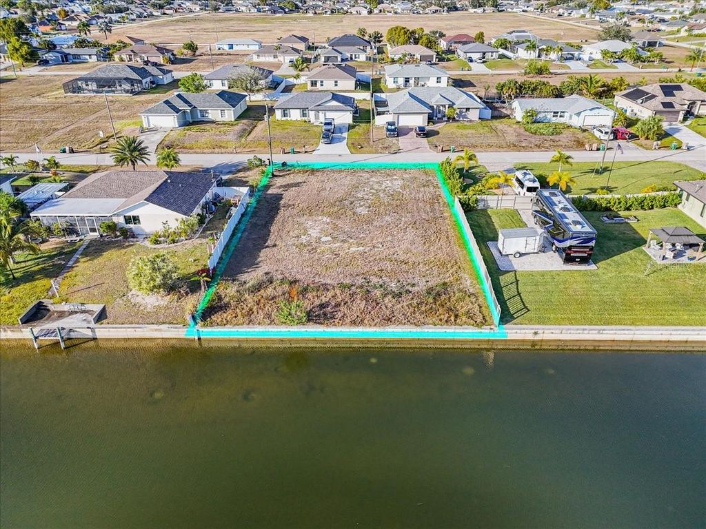 Photo of 322 NE 20th Street, Cape Coral, FL 33909 (MLS # C7521432)