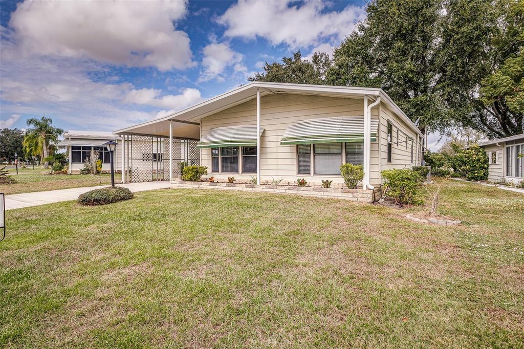 Photo of 6027 Grand Oaks Drive SE, Winter Haven, FL 33884 (MLS # L4956878)