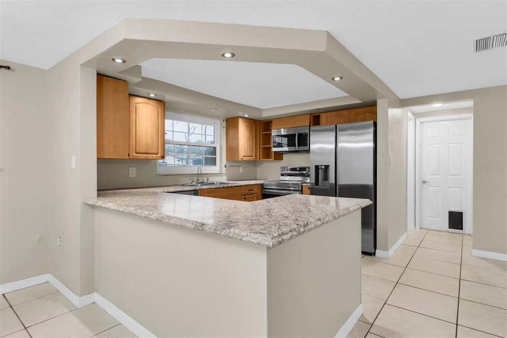 Photo of 9203 Greenbriar Lane, Port Richey, FL 34668 (MLS # W7888078)