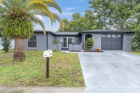 Photo of 9203 Greenbriar Lane, Port Richey, FL 34668 (MLS # W7888078)