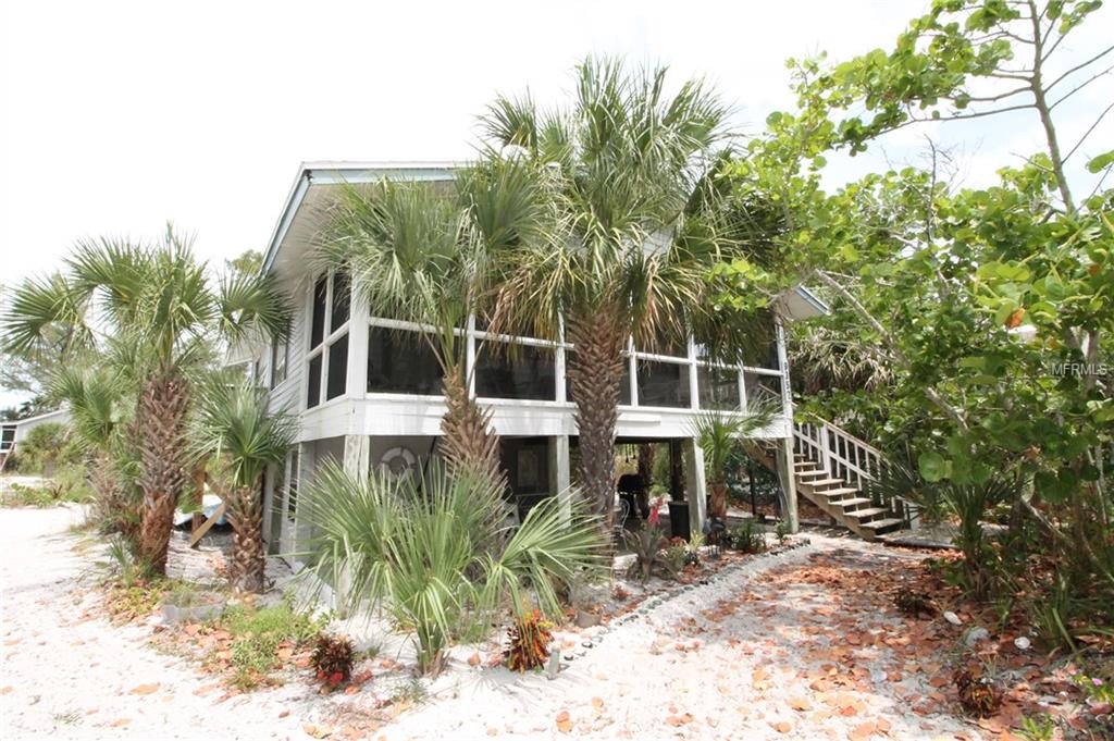 RENOVATIONS COMPLETE FROM HURRICANE DAMAGE.....SHORT TERM VACATION RENTAL........Welcome to "How Sweet It Is".......Can be rented Weekly......This gorgeous island home is only steps to the beach via a boardwalk over the dunes. Watch your blood pressure drop as you enjoy the sunsets or simply relax on the screened lanai. You may choose to take a care free tour of the island in your island golf-cart that is included with your rental or enjoy the satellite TV, DVD player and VCR that are provided for your convenience. Whatever your preference you will find everything you could possibly need in this house. Make your reservations today!!!
Accommodates 5 guests maximum
Beds: 1 Queen, 2 Twin, 1 Queen Sleeper Sofa.
Amenities include: Air-conditioning, propane grill, hot and cold private outside ‘”after-swim” shower, washer/dryer, linens included, dishwasher, microwave, toaster, coffee maker, water purifier, dishes/utensils, pots & pans, hair dryer, satellite TV, DVD player, VCR, stereo, CD player.
Extras: Wifi, oversized hammock, large inflatable raft, blender, movies, books, games (horse shoes & volleyball), community lighted boat dock with water and fish cleaning table, boardwalk to beach.
Sorry, No Smoking. Pets are permitted upon owner approval and require a $150 non-refundable pet fee.
Weekly $1,400.00
Monthly $4,500.00