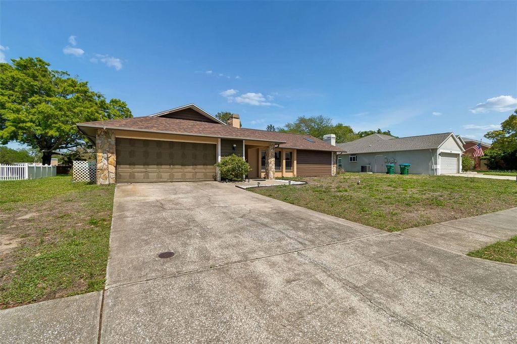 Photo of 1039 Northridge Drive, Palm Harbor, FL 34683 (MLS # TB8488020)