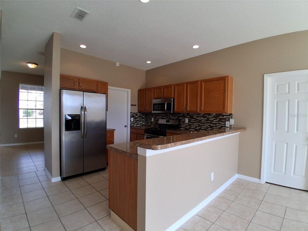 Photo of 325 Piano Lane, Davenport, FL 33896 (MLS # O6395926)
