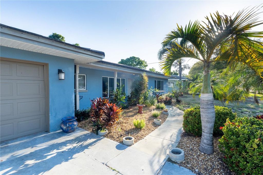 Photo of 33 Southwind Drive, Belleair Bluffs, FL 33770 (MLS # TB8498460)