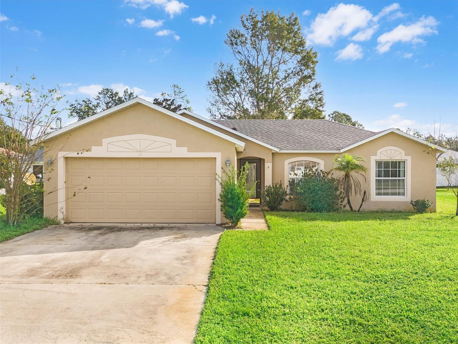 Welcome to your dream home in the tranquil Palm Coast community! This stunning single-family residence boasts a spacious layout designed with families in mind. With four cozy bedrooms and two modern bathrooms, there's ample space for everyone to enjoy comfort and privacy. A newly installed roof in 2022 provides peace of mind and a touch of modernity to the home's exterior. Inside, the heart of the home shines with stainless steel appliances that add a sleek and efficient edge to meal preparations. The split bedroom floor plan ensures a serene retreat for the primary bedroom, complete with an en suite for that extra touch of luxury and convenience. Entertain with ease in the generous open floor plan, where natural light spills in to create a warm and inviting atmosphere for both guests and family. Step outside to discover a large backyard, a blank canvas with plenty of room to customize your oasis, whether that means adding a playground or installing a sparkling pool for the Florida summers. Settle in where comfort meets style in a home that's ready to create lasting memories for your family. Don't miss the opportunity to make it yours!
