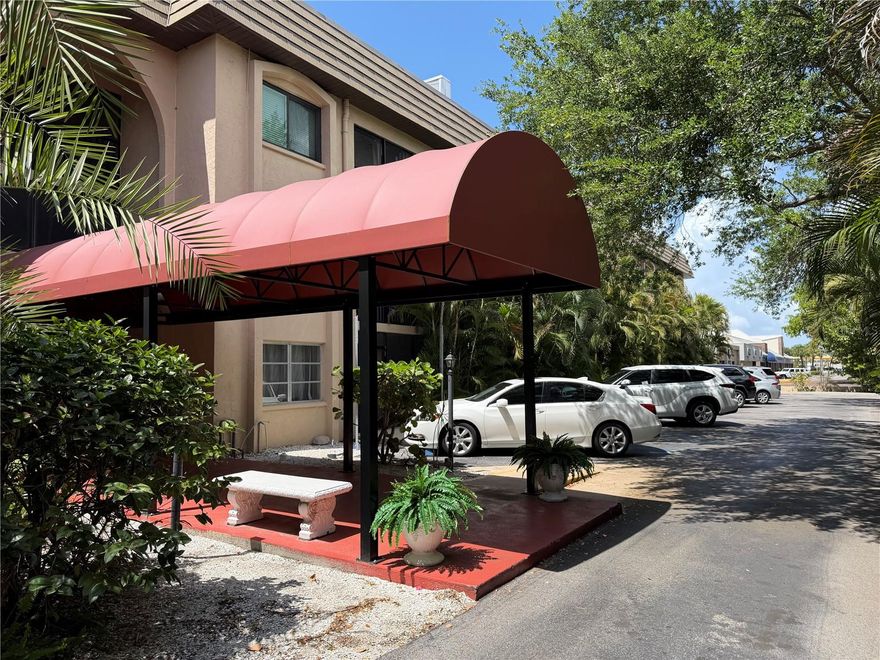 This fully renovated West-of-the-Trail condominium offers a rare opportunity to enjoy one of Sarasota’s most desirable locations at an approachable price point. Thoughtfully updated with custom imported Italian cabinetry and modern finishes, the residence features generous, well-proportioned living spaces that provide a level of comfort and openness not typically found in this price range. The building’s solid concrete construction ensures exceptionally quiet interiors, while elevator access and an in-unit washer and dryer add everyday convenience, complemented by additional shared laundry facilities. Residents are welcomed by a charming interior courtyard with mature tropical landscaping, creating a peaceful and inviting atmosphere. Ideally located just 10–15 minutes from Siesta Key Village and its world-renowned beaches, this condo is also minutes from Southside Village on Hillview Street, where you’ll find popular dining spots such as Libby’s Neighborhood Brasserie, Veronica Fish & Oyster, Morton’s Gourmet Market, and Pacific Rim. Everyday essentials are within easy reach, including Trader Joe's, Publix, and Sarasota Memorial Hospital, along with additional shopping and dining along US-41 near Bay Road. While the community offers a more relaxed lifestyle without resort-style amenities such as a pool or gym, it makes up for it with larger living spaces, quiet construction, and an unbeatable location. This is an outstanding opportunity to own a move-in-ready Sarasota condo near Siesta Key at a highly competitive price.