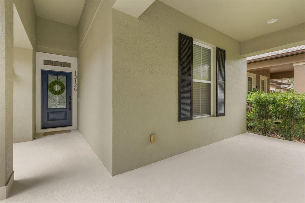Photo of 13125 Penshurst Lane, Windermere, FL 34786 (MLS # O6449706)