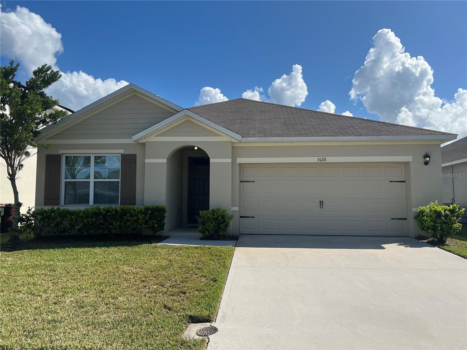 Come to see this beautiful 3 bedroom 2 bath home ready to Move-in in the Canopy Walk Community. This SMART home (Alexa, security system) is minutes away from Lake Nona. Located in South Narcoossee and Hwy 192 in Saint Cloud. This gorgeous home features an open floor plan with upgraded kitchen cabinets and countertops, tile floors in living areas and beautiful brand new wood plank vinyl floors in the bedrooms. The community is filled with great amenities such as park, walking nature trails, dog park, playfield, peaceful ponds and natural landscape.The brand new Master Academy St. Cloud (K-8) is right across the street from the community. Schedule your showing today!