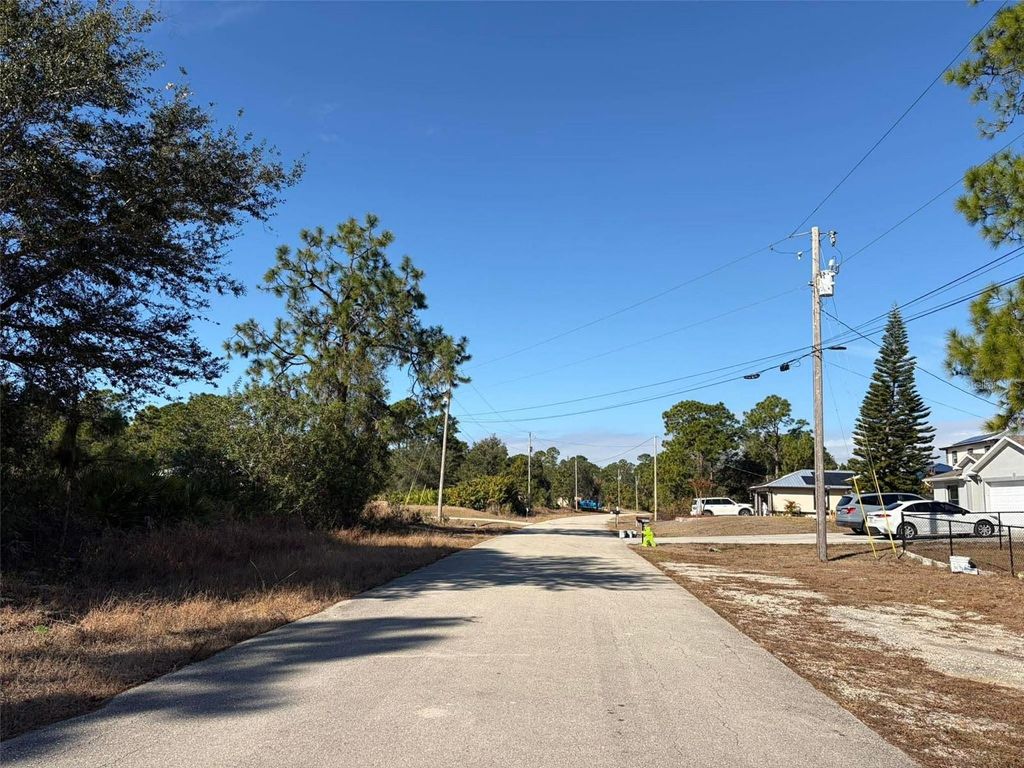 Photo of 1036 Pilgrim Street E, Lehigh Acres, FL 33974 (MLS # TB8475278)