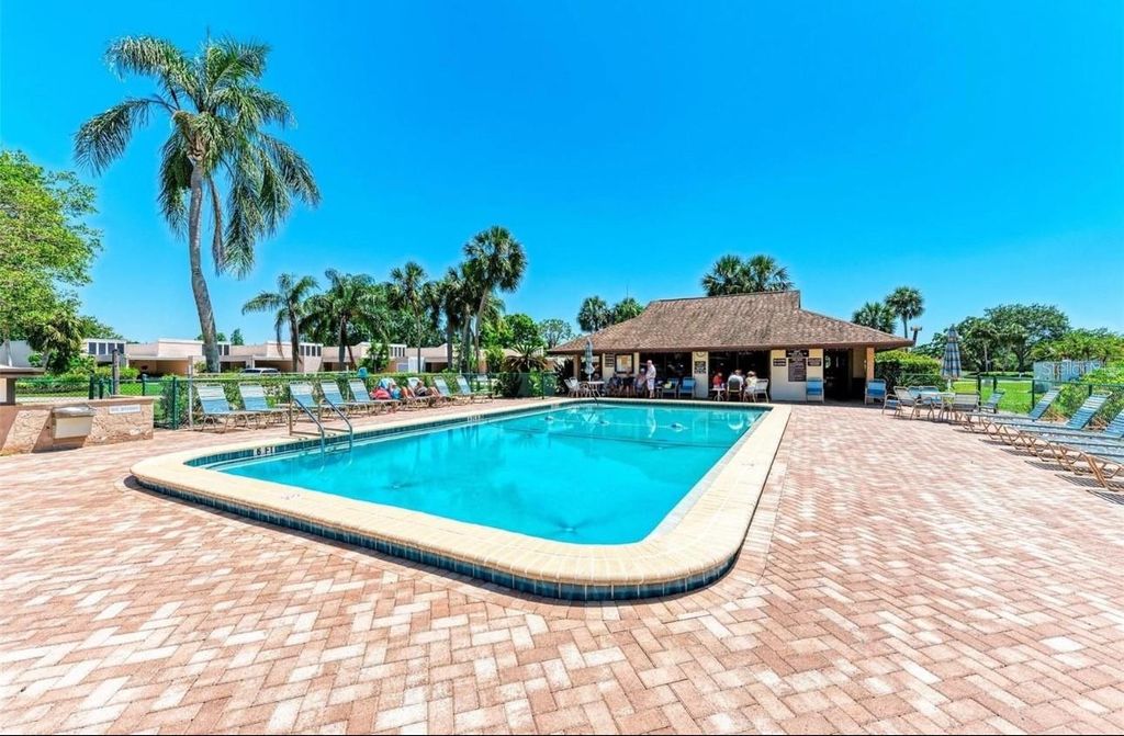 Photo of 6116 43rd Street W #401D, Bradenton, FL 34210 (MLS # A4673691)