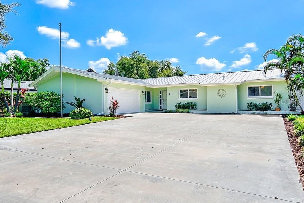 Photo of 809 Jacaranda Drive, Largo, FL 33770 (MLS # TB8550341)
