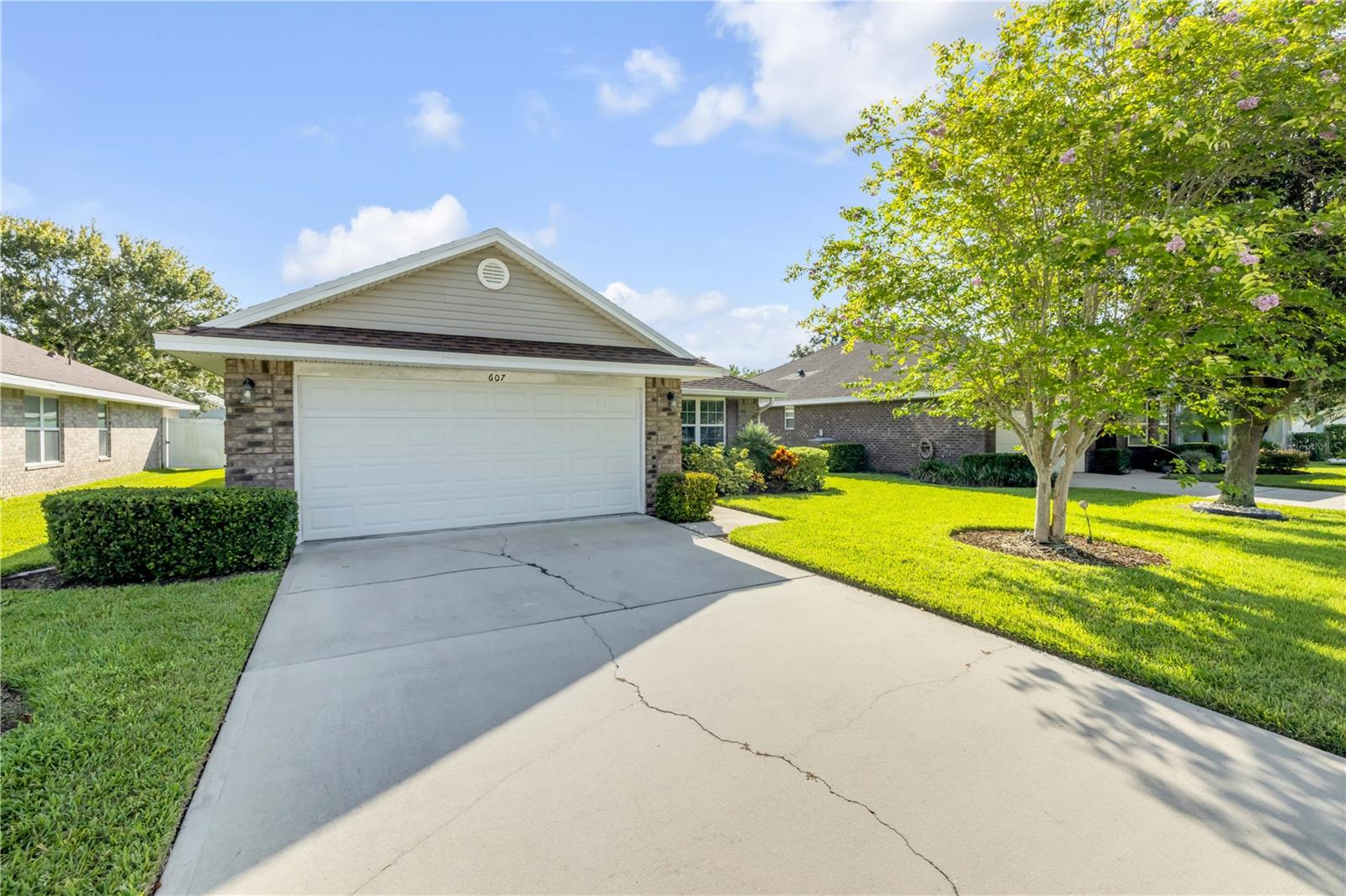 Welcome to 607 Coral Trace Boulevard, a beautifully maintained 3 bedroom 2 bathroom single family residence offering light filled living space. This home is ideal for those seeking low maintenance, contemporary living in a vibrant gated community. Located within Coral Trace, a quiet family oriented enclave recognized for its well kept homes, friendly neighbors, and suburban charm, this property benefits from a low monthly HOA fee that covers amenities such as the clubhouse, community swimming pool, fitness center, and landscaping upkeep.
Families will appreciate the location’s access to quality schools including Edgewater Public Elementary, New Smyrna Beach Middle, and New Smyrna Beach High School, all within approximately 3 miles. Living in Coral Trace also means enjoying convenient access to shopping centers, parks, dining, and quick routes to I95 for easy commuting. Beaches, boating, golf courses, and Port Canaveral are also within a short drive, making this location perfect for both everyday comfort and weekend escapes. This home offers excellent value in one of Edgewater’s most desirable communities.