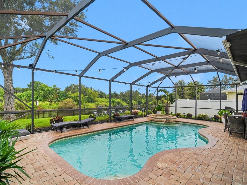 Photo of 7124 34th Street E, Sarasota, FL 34243 (MLS # A4702245)