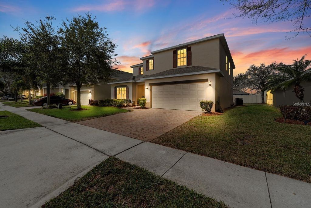 Photo of 754 Andalusia Loop, Davenport, FL 33837 (MLS # TB8454956)