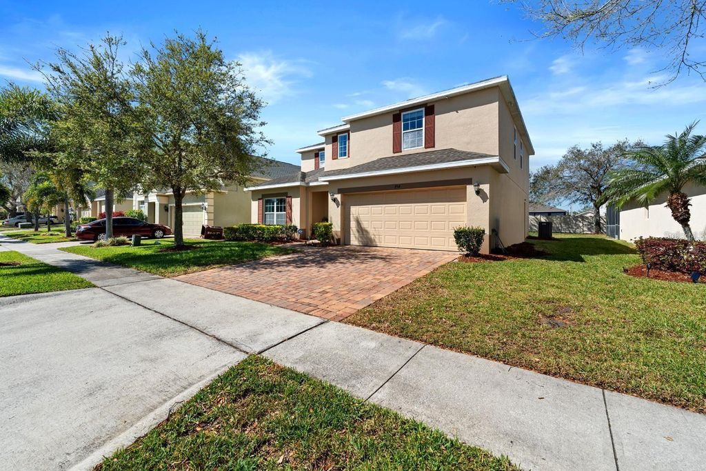 Photo of 754 Andalusia Loop, Davenport, FL 33837 (MLS # TB8454956)