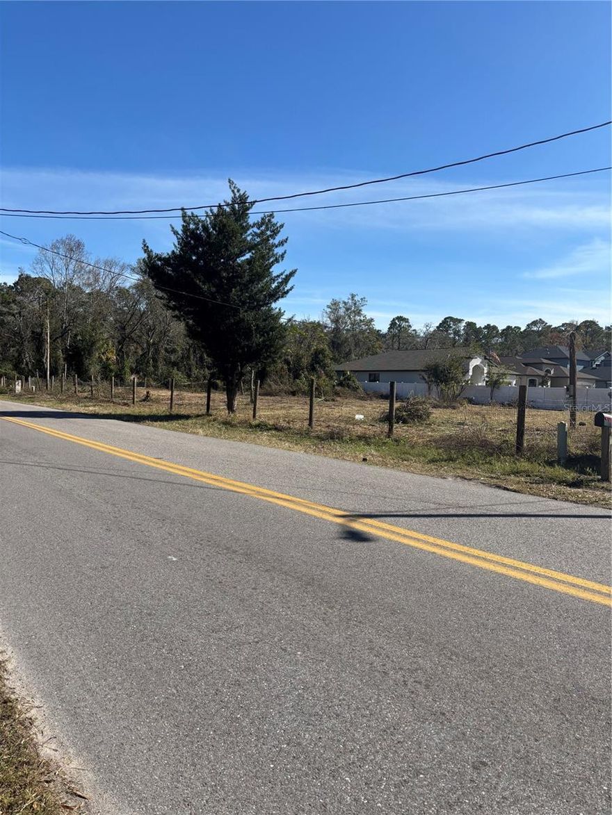 Build your home on this large residential site.  This area is booming and close to shopping, restaurants, schools, hospitals, entertainment and other support facilities.NO HOA, NO CDD, NO FLOOD ZONE. Park your RV or Boat with no problem.  It has access to Moon Lake Park where there is a ski lake, basketball court, playgrounds and more.  Contact Pasco County for any zoning and building restrictions.