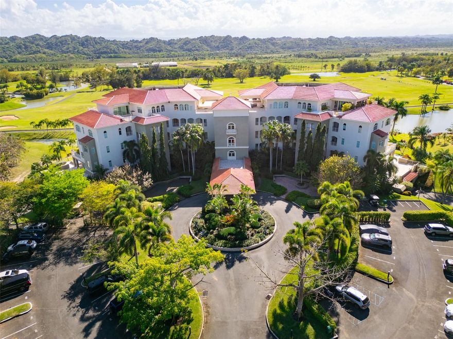 Located within the gated community of Plantation Village inside Dorado Beach Resort Residences, this fully renovated penthouse offers a refined blend of modern elegance, comfort, and resort-style living. Spanning approximately 2,074 square feet, including its spacious balcony, the residence features an open-concept design that seamlessly connects the kitchen, dining, and living areas. Natural light fills the interiors and extends onto an expansive terrace overlooking the Sugarcane Golf Course, creating a serene setting ideal for entertaining or enjoying Dorado’s spectacular sunsets. The property offers three spacious ensuite bedrooms, three and a half bathrooms, a walk-in closet in the primary suite, and a dedicated laundry area. Designed with both style and functionality in mind, the residence includes high-end finishes and top-of-the-line appliances, providing a move-in ready opportunity. The penthouse includes two covered parking spaces with a private storage area, additional parking for a golf cart, and one exterior parking space for added convenience. Residents enjoy 24/7 private security, a full backup generator, and a water cistern, ensuring uninterrupted comfort and peace of mind. As part of the Dorado Beach lifestyle, residents benefit from access to direct beach entry, championship golf courses, tennis and basketball courts, Watermill Water Park, the Ritz-Carlton Reserve, and Encanto Beach Club & Spa. Conveniently located near private schools, fine dining, medical facilities, and premium grocery stores, this penthouse represents luxury living in Dorado Beach.