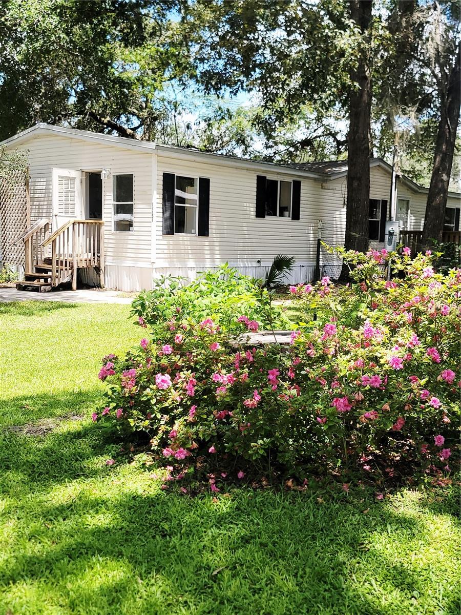 Charming Renovated 3-Bedroom Home Near Manatee Springs!
Welcome to this beautifully updated 3-bedroom, 2-bathroom home offering 1,512 square feet of peaceful living space on a beautiful .16 acre lot. This move-in ready property features brand new luxury vinyl plank flooring, fresh interior paint, and stylish updates throughout—including new ceiling fans, light fixtures, smoke detectors, a modern thermostat, and new AC ductwork for improved efficiency.
The home boasts generously sized bedrooms, each with walk-in closets, and plenty of storage throughout. The kitchen is equipped with sleek, marble-look countertops and flows into a spacious living area, perfect for both relaxing and entertaining.
Step outside to enjoy a large deck ideal for BBQs or peaceful evenings in the quiet, tree-lined yard. Additional highlights include a durable metal roof, a brand new mailbox, and a friendly, established neighborhood with no HOA and no lot rent—you own the land!
Conveniently located just minutes from Manatee Springs State Park, the Suwannee River, Chiefland Golf & Country Club, local schools, shopping, and restaurants. Experience the best of tranquil country living with all the perks of nearby amenities.