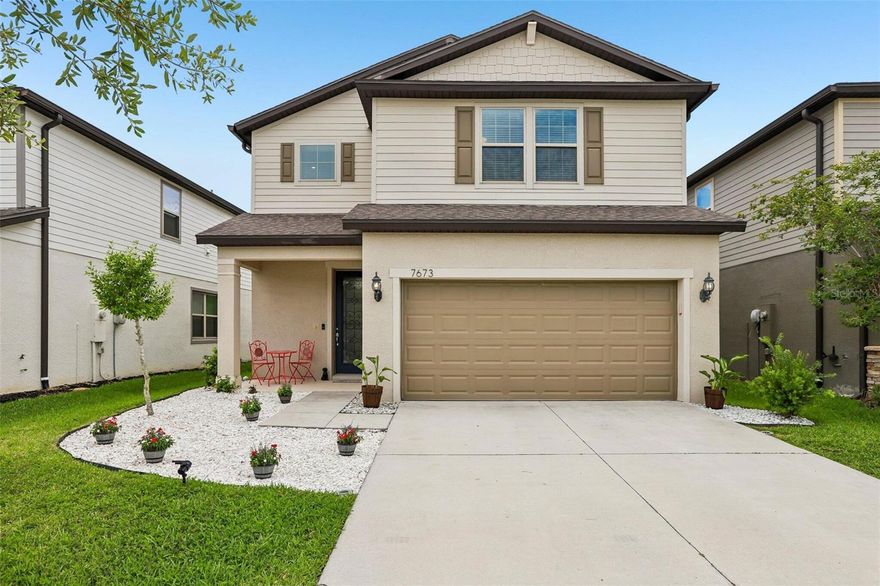 Welcome to this beautifully maintained 4-bedroom, 3-bathroom home located in the highly desirable Epperson Ranch community. Built in 2019, this spacious two-story residence has over 2,170 square feet of thoughtfully designed living space with an open-concept floor plan for both everyday living and entertaining.

The gourmet kitchen features granite countertops, stainless steel appliances, subway tile backsplash, custom cabinetry, and a large center island overlooking the kitchen. A first-floor bedroom and full bath provide flexibility for guests, a home office, or multigenerational living.

Upstairs, enjoy a versatile loft area for a media room, playroom, or work-from-home setup, along with a spacious owner's suite featuring dual vanities, a large walk-in closet, and an oversized walk-in shower. Additional upgrades include vinyl plank flooring both downstairs and upstairs, epoxy garage flooring, custom storage shelving, upstairs laundry, and a fenced in private conservation-view backyard with a brick paver patio for relaxing or entertaining outdoors.
Located within the award-winning Epperson Lagoon community, residents enjoy access to the famous Crystal Lagoon. The community provides access to ULTRAFi high-speed internet connectivity and Spectrum cable tv access, both included in the HOA fees.

Families will appreciate access to highly rated private and charter schools, including Innovation Preparatory Academy, Union Park Charter Academy, Kirkland Ranch Academy of Innovation, and Pinecrest Academy Wesley Chapel. The zoned public school is Wesley Chapel School District.

The area continues to experience incredible growth and investment, including the new Johns Hopkins Hospital currently under construction near Overpass Road and I-75. Scheduled to open in 2027, the state-of-the-art pediatric hospital campus will bring advanced specialty healthcare, emergency services, rehabilitation, and outpatient care to Wesley Chapel and surrounding communities, and career opportunities.

Conveniently located near Tampa Premium Outlets, KRATE at The Grove, Wiregrass Mall, major highways, dining, entertainment, and everything in the Wesley Chapel area - this home combines modern comfort, custom fixtures, and exceptional long-term value in one of Tampa Bay's most desirable communities.