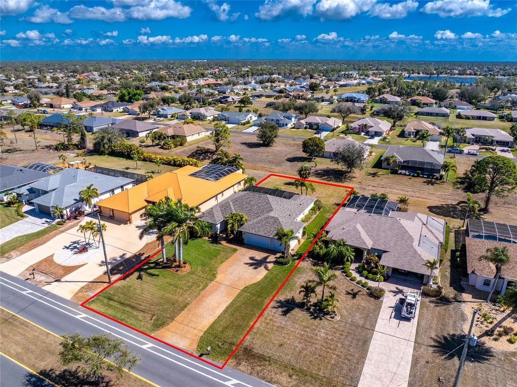 Photo of 250 Rotonda Boulevard N, Rotonda West, FL 33947 (MLS # D6146180)