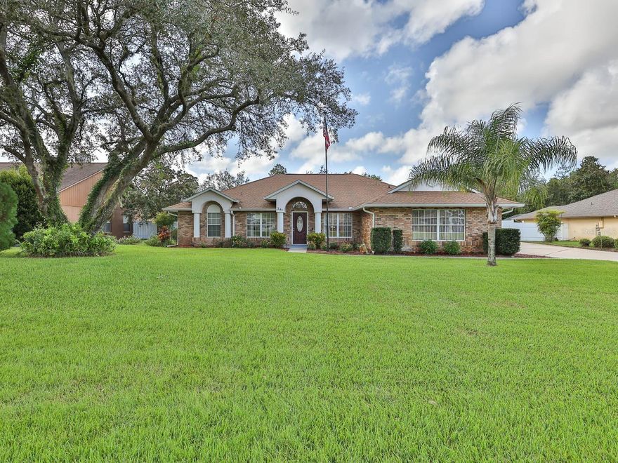 POOL HOME IN ONE OF DEBARY'S MOST POPULAR GOLF COMMUNITIES, GLEN ABBEY.  This lovely home has been well cared for and features an open floor plan with 3 bedrooms, 2 baths, formal living room, formal dining room, spacious kitchen, breakfast area and large great room/family room.  The remodeled kitchen offers lots of cabinet space ~ breakfast bar ~ granite countertops ~ stainless steel appliances.  The master bathroom was completely remodeled with his and her vanities and a nice size walk-in shower.  Other home features are high vaulted ceilings, planter shelves, built-in surround sound in the living room (extends to the patio too) and a split bedroom plan. 
Many upgrades made throughout the home to include the remodeled kitchen and both baths, flooring (bedrooms, living room & dining room), fans & light fixtures, added recessed lighting in the kitchen & family room, replaced the sliding glass doors, new interior paint, Bosch A/C system (6.5 yrs old), new water softener system (6 months old), pool resurfaced (2yrs ago) and converted to saltwater with a new high efficiency pump (both 3 yrs ago), pool enclosure rescreened (4yrs ago), pavers installed in the pool area/patio (2yrs ago), water heater (7yrs old), Generac portable gas generator (runs the whole house), Ring doorbell w/full perimeter security system and shed w/electric (10 yrs. old).  This home sits on an oversized lot just under 1/2 an acre with it's manicured lawn and landscaping.  The sprinkler system was replaced this year and there is a well for the irrigation.  The home's front elevation has a side entry garage plus the extended driveway accommodates plenty of parking.  The huge backyard is completely fenced with vinyl fencing and great for entertaining and having those summer barbeques and pool parties.  Glen Abbey is a beautiful neighborhood with few homes available.