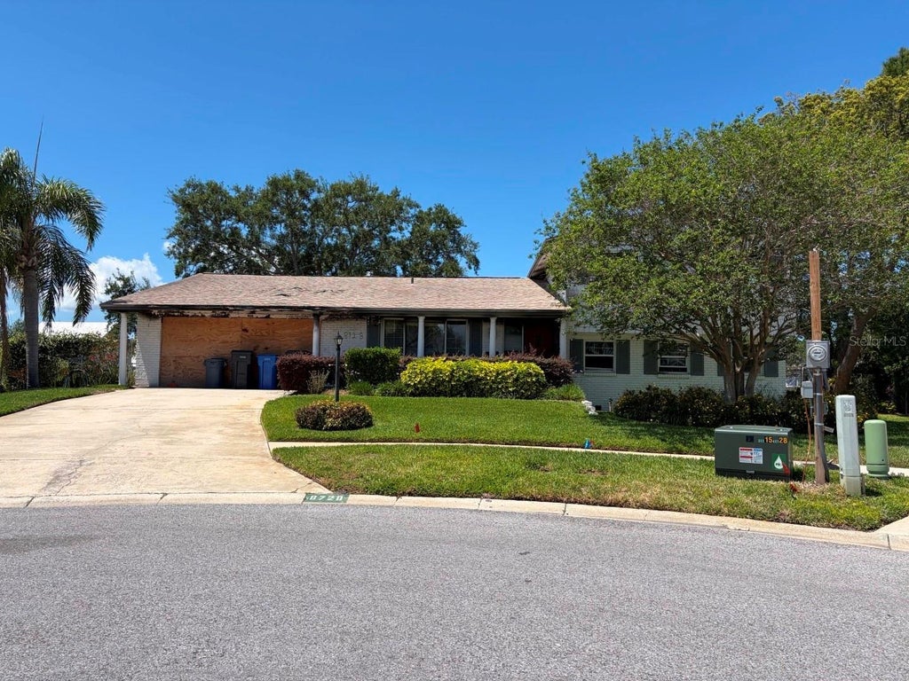 Photo of 8728 Cobblestone Drive, Tampa, FL 33615 (MLS # TB8517989)