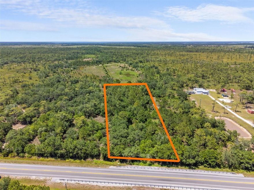 Nestled just east of Lake Wales, this expansive 2.31-acre residential lot offers a perfect canvas for your dreams. With a generous 163 feet of road frontage on State Road 60E, your gateway to Florida’s bustling corridors and serene landscapes begins here. Ideal for outdoor enthusiasts and welcoming to farm animals, this property is a rare find. Positioned strategically between the adventure of Westgate Resort River Ranch, and the amenities of Indian Lake Estates and Lake Walk-in-Water, this parcel of land promises a life balanced by peace and excitement. Its central location is a significant advantage, offering straightforward access to both of Florida's east and west coasts, the Florida Turnpike, I-95, and the myriad attractions of Orlando. The lot is enveloped by lush woodlands, offering a private escape with the convenience of Lake Wales city amenities just a short drive away. Imagine living only 20 minutes from the enchanting Bok Tower Gardens and 30 minutes from the family-friendly Legoland in Winter Haven. Additionally, the accessibility of a one-hour drive to both Orlando and Tampa unlocks a world of entertainment and professional opportunities. This property is not only about the joy of today but also the potential of tomorrow. As Lake Wales experiences a surge in growth, this location is becoming increasingly desirable. Whether you're looking to build your dream home, secure a promising investment, or simply own a piece of Florida's natural beauty, this lot represents endless possibilities. Embrace the serenity of wooded landscapes and the convenience of life near thriving cities. Please note, buyers should exercise due diligence in verifying land use possibilities with Polk County planning and zoning to ensure this dream can become your reality. Put this link in your GPS for Google Maps to find it (https://maps.app.goo.gl/spvbwbwQwbxQ7ce17)