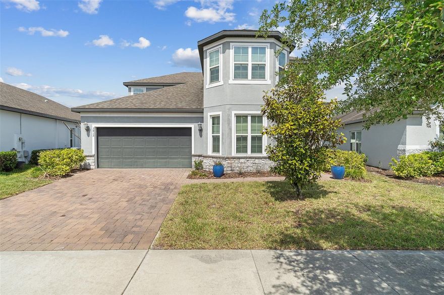 Summer is right around the corner, make a splash in your own private pool home with a summer kitchen and fenced yard! This spacious 5 bedroom, 3.5 bath Jackson Model with a 2 car garage is located in the highly desirable Harmony, FL community and offers beautiful water views. From the moment you arrive, you will appreciate the paver driveway and walkway leading to a welcoming entry. Inside, the front of the home features a formal dining room and a private office, perfect for entertaining or working from home. Continue inside to an open concept layout where the kitchen shines with stainless steel appliances, recessed lighting, a closet pantry, and a large chef’s island, seamlessly flowing into the expansive living room. Step outside to your own backyard retreat, complete with a covered brick/tile patio and a sparkling pool, all enclosed by vinyl fencing for added privacy, ideal for relaxing or hosting on warm Florida days. The main level also features a convenient primary suite and laundry room. Upstairs, you’ll find a generous secondary living area, four additional spacious bedrooms, and two full bathrooms, offering plenty of room for family and guests. Don’t miss the opportunity to enjoy comfort, space, and resort style living all in one beautiful home! Ideally located near Harmony Community School, this home offers golf-cart-friendly access through a nearby tunnel to Harmony Middle and Harmony High School. Residents enjoy exceptional amenities including Buck Lake with community pontoon boats, kayaks, canoes, and a fishing pier, along with resort-style pools, dog parks, playgrounds, walking trails, a fitness center, and bike paths. Enjoy easy golf cart rides to the neighborhood coffee shop, pizza restaurant, and Mexican dining. Conveniently located near Orlando International Airport, Medical City in Lake Nona, and Florida’s East Coast beaches, Harmony offers the perfect blend of lifestyle, nature, and location. Don’t miss your opportunity to own this move in ready home! Schedule your private showing today! Buyer to verify all room measurements.