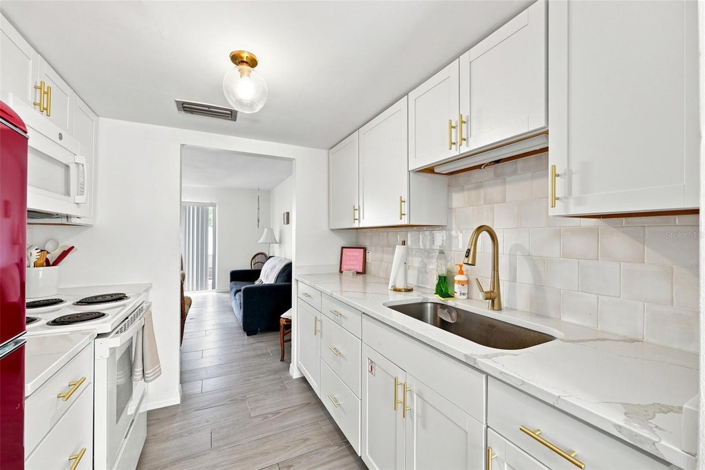 Photo of 4215 E Bay Drive #1403, Clearwater, FL 33764 (MLS # TB8543047)