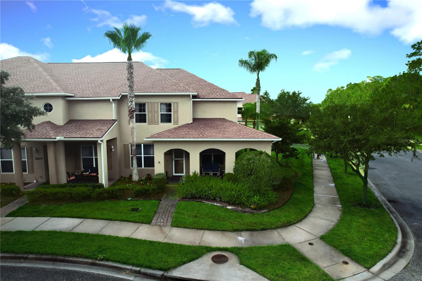 Welcome to Parkside Townhomes at Venetian Bay! This 2 bdrm/2.5 bath Townhome in the very desirable Venetian Bay community sits on a large corner lot with privacy and great views from the covered wrap-around patio. Walk inside the over-sized front door and be welcomed to an open floor plan with towering cathedral ceilings. The extra-large family room offers plenty of space for relaxing or entertaining and seamlessly flows into the front light-filled area that can double as a dining room or home office. The modern kitchen features ceramic tile flooring, bright cabinets, stainless steel appliances, beautiful stone countertops with undermount sink. The breakfast bar opens to another large dining or entertaining space. The second level features a master suite with shower and walk-in closet, and a second bedroom with full bath and shower. The quiet nook area is perfect for relaxing with a good book and overlooks the family room below. The laundry room with newer washer and dryer and utility sink leads out to a spacious 2 car garage that is accessed from the back alleyway. Catch a tan or exercise in the community pool that is a short walk away. The Venetian Bay communty features a fantastic 18 hole golf course, shops, deli, brewery, and The Bistro 424 restaurant- a local favorite! Close to shopping, dining, and some of the most beautiful beaches in Florida, this unit is priced to sell and is move-in ready! Call today for a private showing.