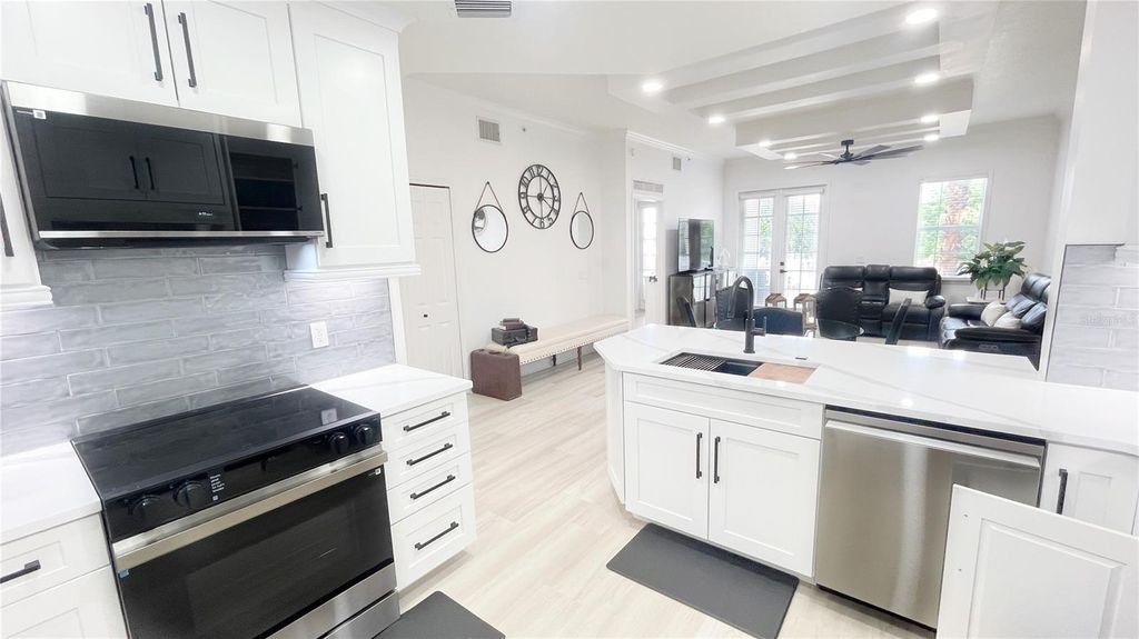 Photo of 1501 Northern Harrier Way #202, Reunion, FL 34747 (MLS # O6414442)