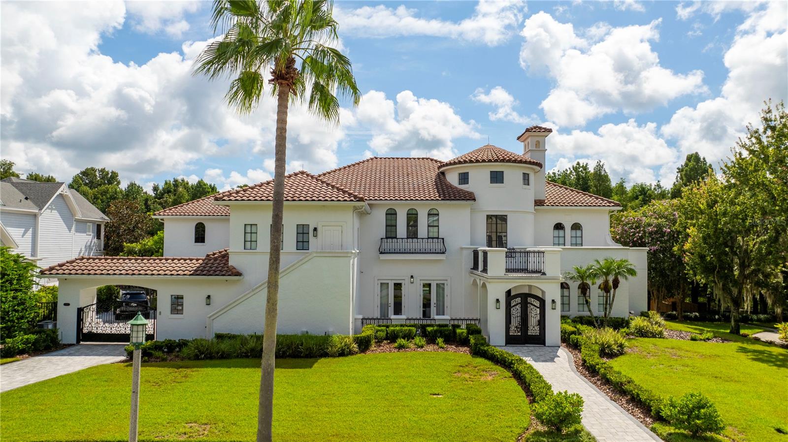 SPECTACULAR LAKEFRONT Contemporay Estate
Discover Florida’s luxury lifestyle in this breathtaking 8,000+ sq. ft. lakefront masterpiece on Celebration’s most coveted street. Offering stunning water and conservation views, this fully renovated contemporary estate is thoughtfully designed with dramatic high ceilings, a grand spiral staircase, and exquisite flooring througout.
The open floor plan boasts 8 spacious bedrooms, 9.1 beautifully appointed bathrooms, and a luxurious owner’s suite, a large dressing room, and a private balcony with sweeping lake views. Entertainment options abound with a private theater featuring its own entrance, surround sound, and projector and a spacious game room.
Step outside to an extraordinary outdoor living space complete with a lakefront pool, summer kitchen, fireplace, and panoramic views—perfect for hosting gatherings or relaxing by the water. A fully equipped in-law suite with a private entrance and full bath provides exceptional versatility for guests or extended family.
This spectacular estate is ideal for families seeking elegance, comfort, and year-round indoor and outdoor entertainment. Stop searching—your dream home awaits!