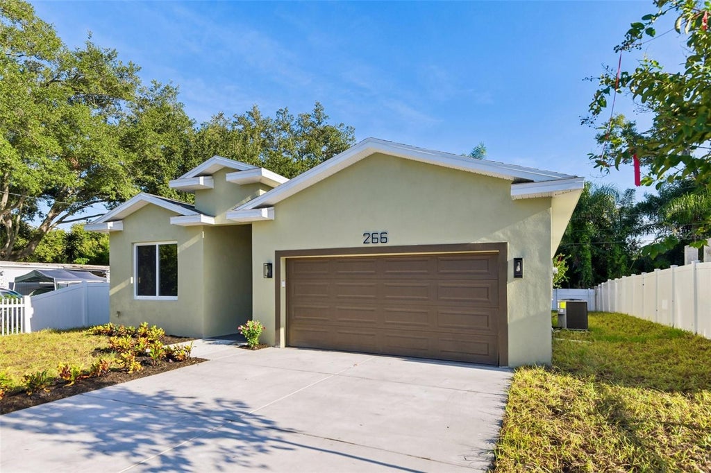 Photo of 266 Platon Avenue, Dunedin, FL 34698 (MLS # TB8511753)