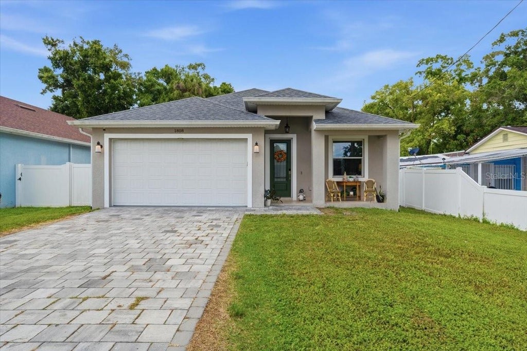 Photo of 1808 W Cluster Avenue, Tampa, FL 33604 (MLS # TB8517659)