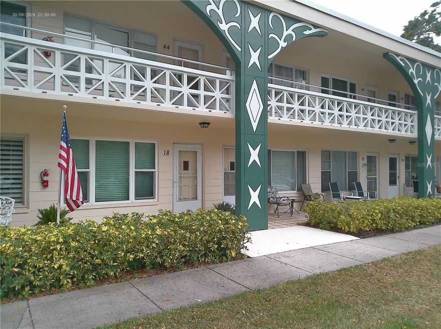 ON THE 18th FAIRWAY! If you've ever thought about living on the golf course, playing for FREE whenever you'd like, having 2 courses to choose from, then you MUST see this 1 Bedroom/1 Bathroom condo in the MONACO building in the fabulous 55+ community of On Top of The World, Clearwater Florida. Think about where you want to be at age 55, 65, 75. Do you want to live simply and actively? Do you want to have your own outdoor space where you can pot flowers and herbs? Do you want to stroll around a lake with geese, ducks, otters and all of Nature at your back door? Now is the time to make a plan. You will be hard pressed to find a more affordable condo that checks all the boxes. Bright and cozy with easy care, laminate flooring throughout. This condo is compact at 735 sq.ft., but it really has all one needs. This floorplan of the Living/Dining/Kitchen is bright and airy. There is space enough in the Bedroom for a Queen-sized bedroom set. The closets are plentiful. All one level makes it easier to "Age-in-Place". The Florida Room offers flex space that can be used as another TV/Media Area, Office or Craft Space. The Utility Nook is equipped with High-Speed Fiber-Optic Internet included in the monthly maintenance fee.  A $150 value!  Step out the back door to find a Covered Patio that has mature plants for privacy. Here is where your GreenThumb gets a workout! This area is a cool refuge in the summer months. Here you can grill out, enjoy tropical, balmy evenings or morning coffee with birds and squirrels. This condo is high & dry! Located in a non-flood zone and non-evacuation zone. HWH is 2016.  HVAC is 2019.  Newer, Insulated Windows.  Insulated back door is 2022.  Electric Panel 100-amp service is 2024.   Are you a "Snowbird" looking to escape the northern winters? You can use this condo in the winter months, then rent it for the Summer to profit until you make a full time move. This Clearwater location is perfect to use as "Home Base". Close to the Best Beaches in the Country! Excellent Shopping, Dining & superb Medical Facilities are nearby. There are Performing Arts Centers, Sports Venues, International & Regional Airports close by & a breeze to navigate to. Check out the small-town flavors of Dunedin, Safety and Palm Harbors. Tarpon Springs, St. Petersburg and Tampa are all an easy commute and are worthy daytrips. On Top of the World boasts 2 golf courses that are FREE for Owners to play. Play 9 holes on the short course or a full 18-hole round. The property has walking trails, Tennis and Pickleball courts, 2 Pools, well-appointed gym, and clubs galore. Take the water aerobics, yoga or line dancing classes. This community is what you make of it. Bring your large dog, there is no size limit. Come for a tour of this condo and the community and start living the Real Florida Lifestyle.