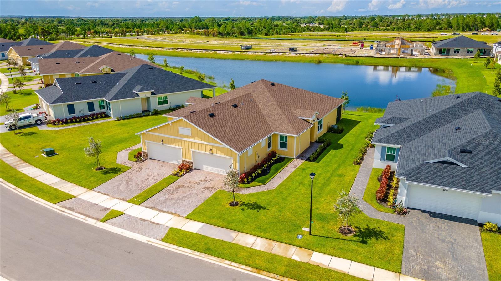 Skip the wait and dusty construction, this upgraded, MOVE-IN ready Azalea model home in The Timbers at Everlands is available NOW! Enjoy the peaceful no-through street with limited traffic and the GRAND OPENING of this active 55+ community's resort-style amenities. Located just outside Melbourne, FL, features include a clubhouse, pool, dog park, tennis & pickleball courts, putting green, walking/golf cart paths, fishing ponds & more. Step inside for a modern take on a classic design with an open floor plan that connects a modern kitchen, dining area & great room for easy living. Featuring luxury vinyl floors, stylish backsplash, new hardware, modern ceiling fans, impact windows, and concrete block construction. You'll enjoy a screened lanai with a water view! The split layout offers a private owner's suite and a seamless entry glass shower. Two additional bedrooms and a flex-space, perfect for an office, pet room, or storage complete the home. Discover how luxurious life can be!