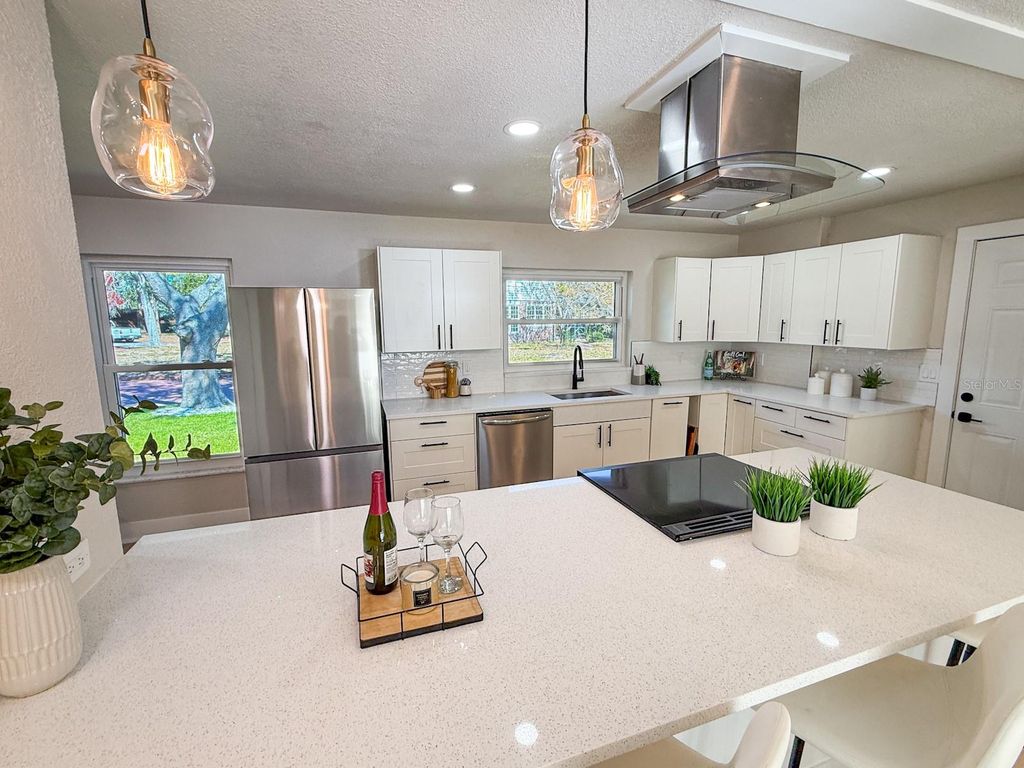 Photo of 1470 Serpentine Drive S, St Petersburg, FL 33705 (MLS # TB8475705)