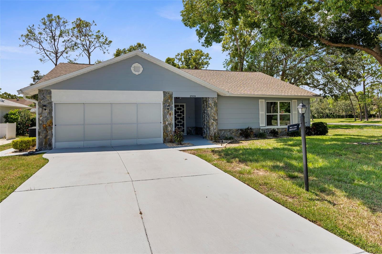 Welcome to this beautifully maintained 2 bedroom, 2 bathroom, 1,462 sq. ft. home located on a desirable corner lot in the highly sought-after 55+ community of Timber Pines. This home offers modern updates including a new roof (2019), energy-efficient windows (2018) with 3M UV protection film, and a new AC system (2018) with air handlers equipped with a UV-C light designed to disinfect the air and surfaces within the HVAC system, reducing bacteria, viruses, and mold for healthier indoor air quality. Inside, you'll love the spacious open floor plan featuring granite countertops, laminate flooring in the main living areas, tile in the kitchen and bathrooms, and carpeted bedrooms for comfort. Timber Pines is a gated, golf course community offering resort-style amenities such as multiple golf courses, pools, tennis, pickleball, fitness centers, and endless activities. Perfect for those seeking an active lifestyle in a secure and vibrant neighborhood, this home combines comfort, convenience, and peace of mind. Don't miss the chance to own this move-in-ready home in one of the most desirable 55+ communities in Florida!