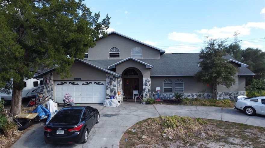 **MULTIPLE OFFERS - HIGHEST AND BEST BY SUNDAY 11/5 AT 9PM** OFFERS WILL BE REVIEWED MONDAY. This expansive 3,093 sqft home is a hidden gem just waiting to be polished. With four spacious bedrooms and three full bathrooms, this property offers the perfect canvas for an investor or ambitious homeowner to create their dream residence. Upon entry, you'll find tile flooring throughout the home, offering durability and easy maintenance. The floor plan is generous, allowing for numerous possibilities in terms of renovations and interior design. The house also boasts a cozy fireplace, adding a touch of rustic charm and warmth to the living space. One of the main highlights of this property is its large 0.30-acre lot. The sizable yard features a swimming pool, providing the perfect opportunity for outdoor entertainment or relaxation during warm summer days. This home is indeed a fixer-upper and requires significant renovation work. However, it presents a perfect opportunity for those who are not afraid of a project. With the right vision and some TLC, this house has the potential to be transformed into a stunning personal home or profitable rental property. Ideal for cash buyers or those utilizing FHA203K financing, this property is an excellent investment opportunity. Don't miss out on the chance to fully personalize this home and restore it back to its former glory!