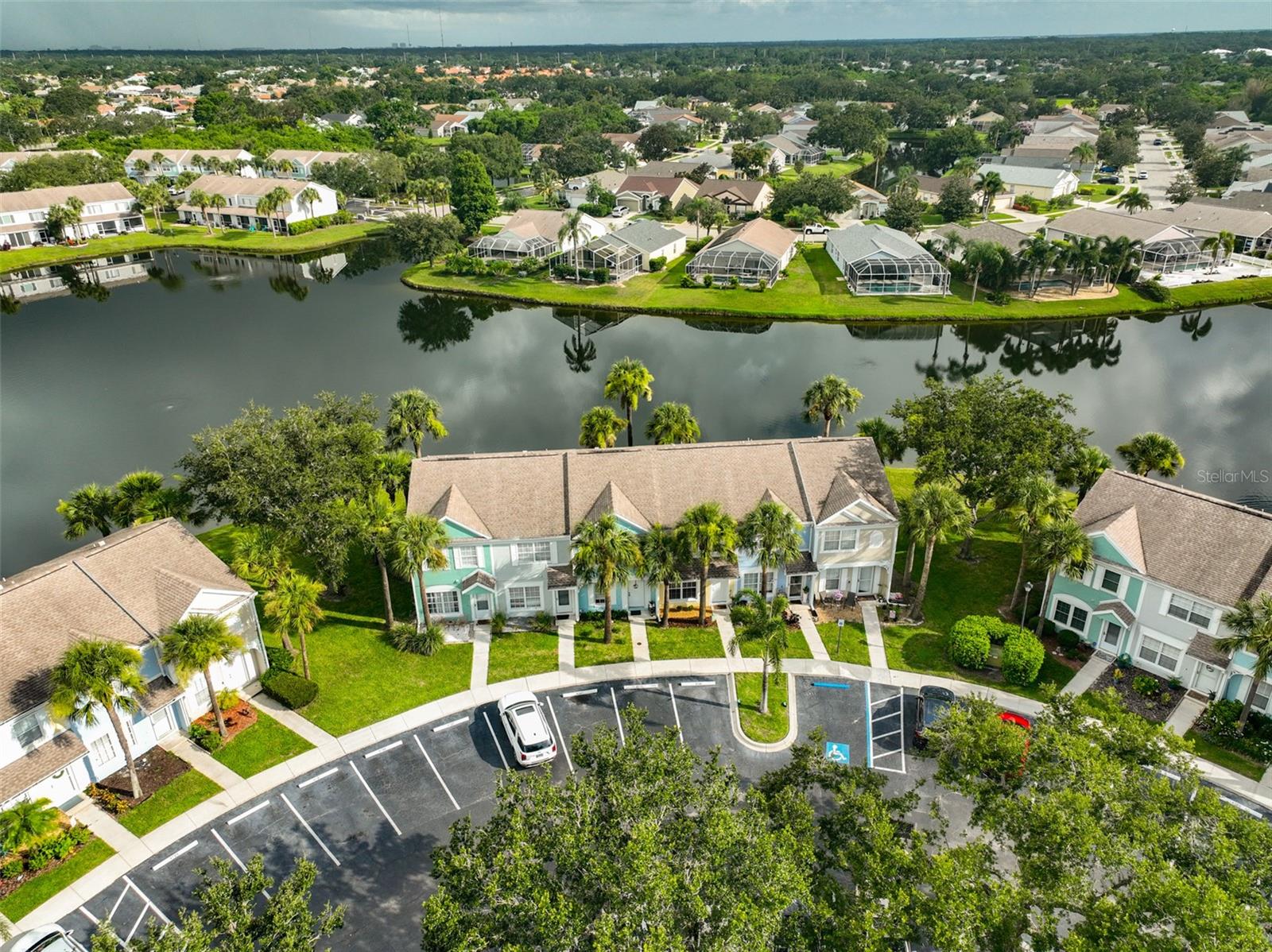 Move-In ready 2-bedroom, lakefront townhome located in a gated community. Everything has just been completed including all interior painting, new flooring, all new kitchen appliances, counter tops in kitchen and upstairs bathroom, sinks, faucets, lighting fixtures and fans. A new a/c was installed in 8/2024. Views of your picturesque lake can be seen from kitchen, screened/covered lanai and master bedroom. Centrally located in Bradenton with shopping, restaurants, golf courses, medical facilities, I-75, US 301 and so much more only minutes away. Easy commute to Sarasota airport for those business trips or getaways. Enjoy some of Florida's finest beaches within a 30-minute drive or less. Sabal Key Community offers the perfect Florida lifestyle for seasonal or year-round living. With no rental restrictions, this beautiful home would also make for a great investment.