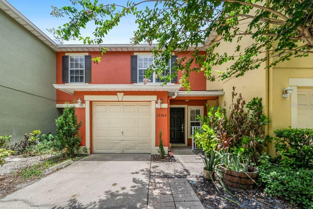 Photo of 13506 Tea Rose Way #112, Orlando, FL 32824 (MLS # O6418563)