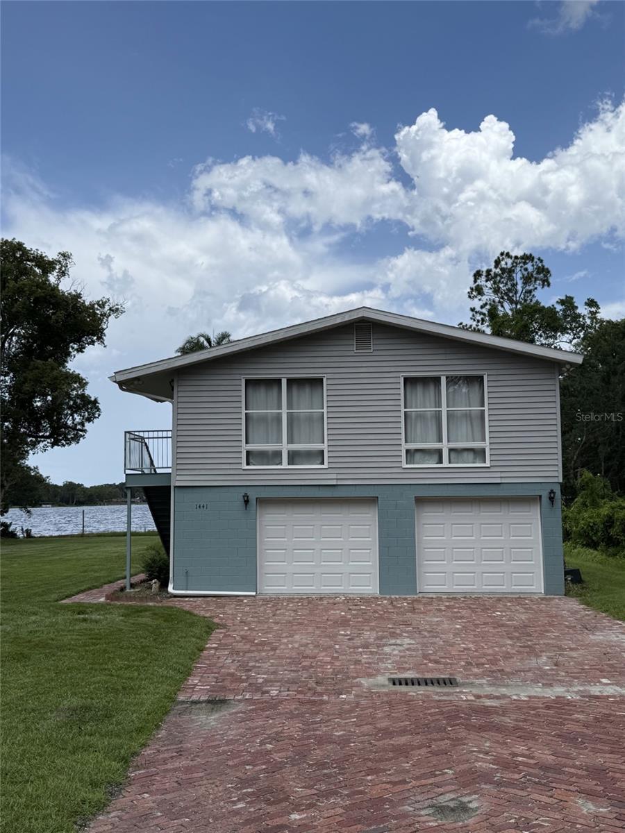 Single Family Home on Large Lot Overlooking Bear Lake! Updated 1 Bedroom, 1 Bath with New Appliances, Wood Laminate Floors, and Double Car Garage. Rent Includes Lawn Care, Water, Sewer, and Garbage. Note that all living area is upstairs, no elevator.