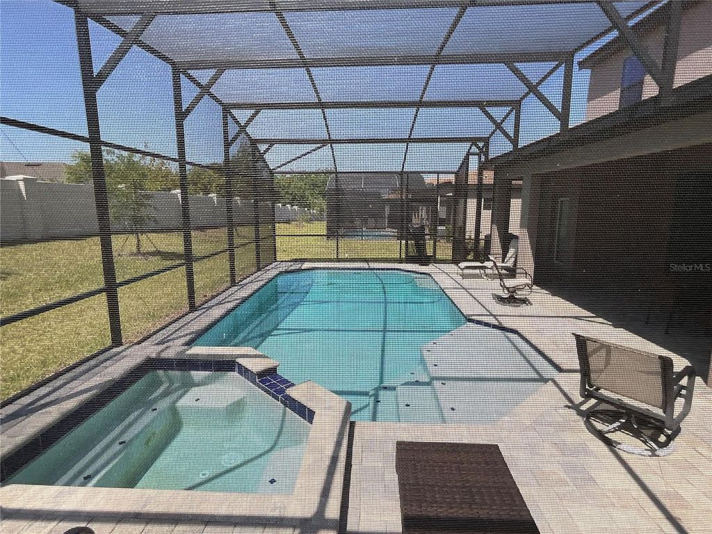 Photo of 226 Macaulays Cove, Haines City, FL 33844 (MLS # O6371407)