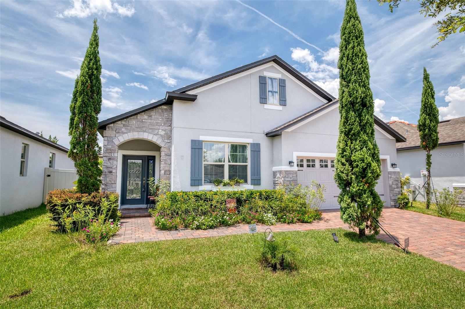 Welcome to this beautifully maintained 4-bedroom, 2-bathroom home with an additional office/flex room, built in 2018 by M/I Homes and offering modern comforts with timeless style.
As you enter through the inviting foyer, you'll find the flex room or office to your right behind elegant French doors – perfect for working from home, studying, or creating a private retreat. Continue down the hallway into the spacious kitchen, featuring stunning quartz countertops, stainless steel appliances, and ample cabinetry for all your culinary needs.
The kitchen flows seamlessly into the open-concept dining and family room, making it ideal for both entertaining and everyday living. The thoughtful split floor plan offers privacy and functionality, with three generously sized bedrooms and a full bathroom located off the kitchen hallway, as well as a convenient laundry room.
The primary suite is privately tucked at the rear of the home and offers a peaceful retreat with a large walk-in closet and a beautifully appointed en-suite bathroom, complete with a double vanity and walk-in shower.
Additional highlights include a fully fenced backyard, a covered and screened-in lanai perfect for outdoor dining or relaxing, and a floored attic providing valuable extra storage space.
Located near a wide variety of restaurants and local shopping options, and just a short drive to the airport and major hospitals, this home offers both comfort and convenience.
Built by M/I Homes, known for quality craftsmanship and energy efficiency, this home is truly move-in ready.
Don’t miss your chance—schedule your private showing today!