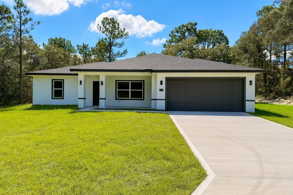 Photo of 2132 W Paragon Lane, Citrus Springs, FL 34434 (MLS # O6353808)